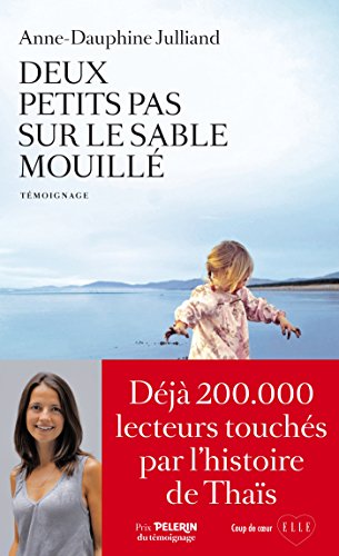deux petits pas sur le sable mouillé